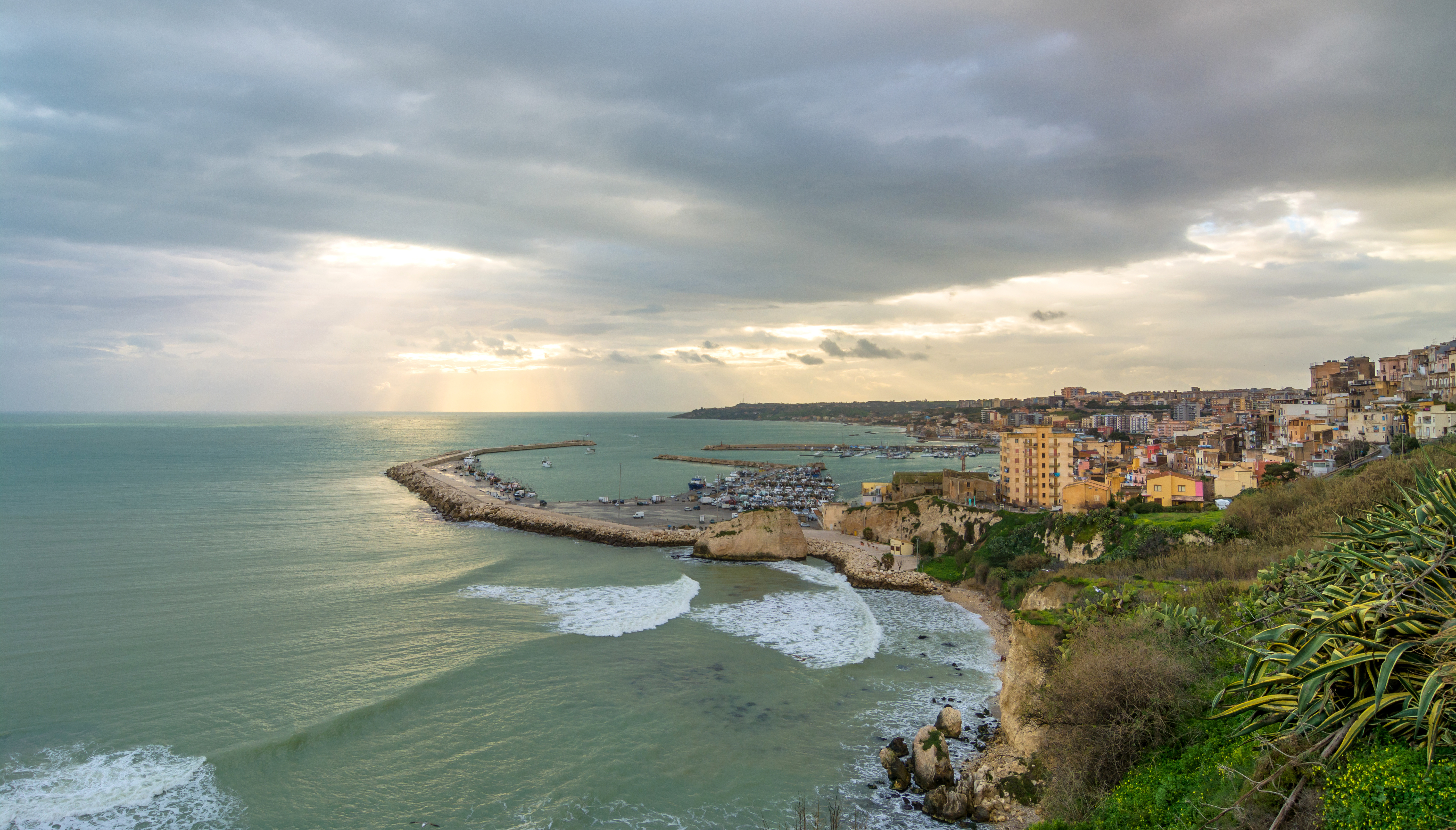 SCIACCA, ITALY - FEBRUARY 22, 2014: panoramic view of coastline with downtown in Sciacca, Italy. Sciacca is known as the city of thermal baths since Greek domination in the 3rd and 4th centuries BC (Licensed stock photo from Adobe Stock)